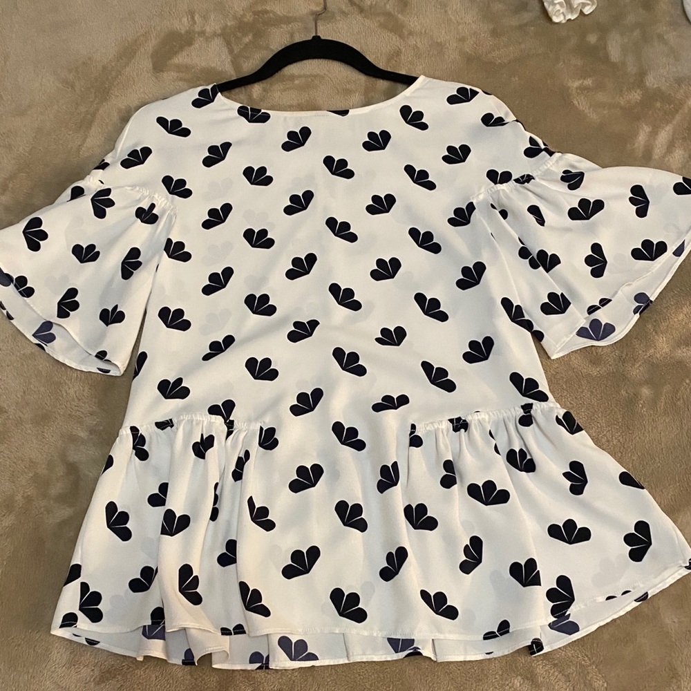 White blouse with black pattern